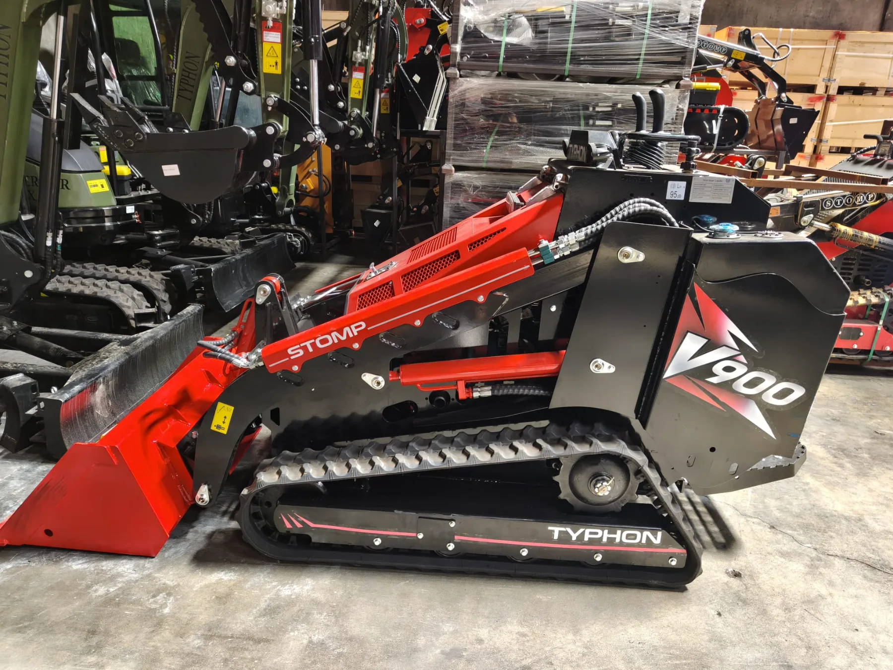 Staged construction equipment inventory awaiting freight loading and dispatch